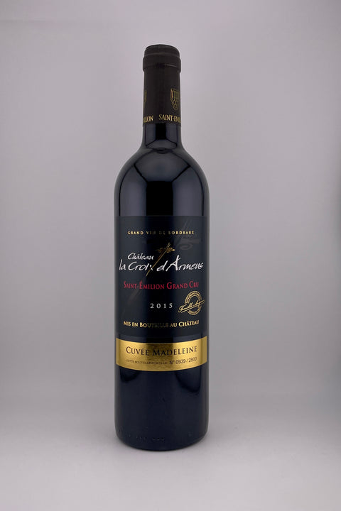 A bottle of 2015 Cháteau La Croix d'Armens St-Emilion Grand Cru red wine.