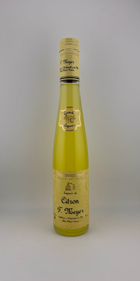 Bottle of citron F Meyer with a label on a gray background
