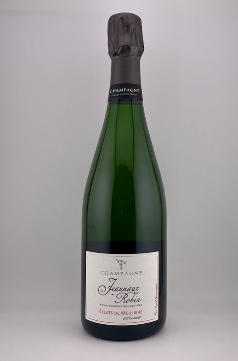 A bottle of Brut Champagne with a label that reads 'JEANEAUX ROBIN, FLAGES MAJEURES, CHAMPAGNE, NV'.