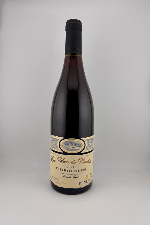 A bottle of 2021 Domaine du Penlois Côtes a Bras Beaujolais Cru red wine, with a label that includes the wine name, vintage, and other details.