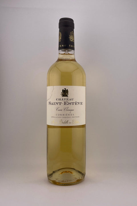 A bottle of Chateau Saint-Esteve Corbiere white wine with a label that includes the brand name and 'Roussillon'.