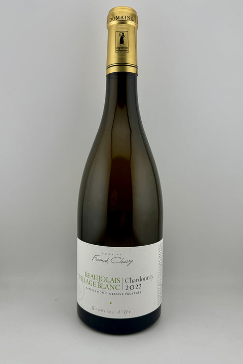 A bottle of Chardonnay wine labeled 'Domaine Franck Chavy, AOP Beaujolais-Villages, 2022', white wine