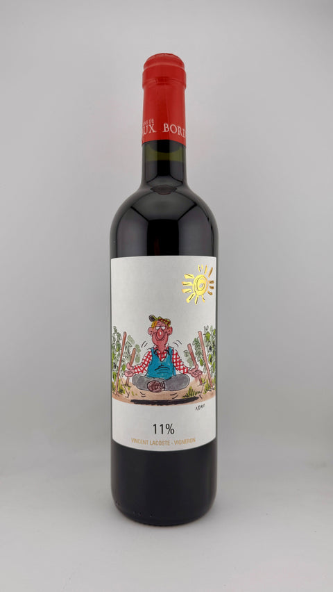 A bottle of Nono, Cháteau de Cranne, AOC Bordeaux (organic) 2023 with a label featuring an illustration of a sun and grapes, red wine