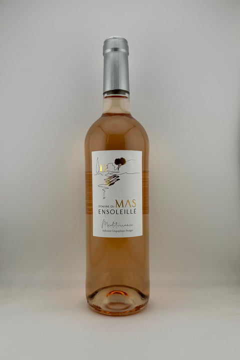 A bottle of Mas Ensoleillé rosé wine with a label that includes the name of the product and the word 'Provence'.