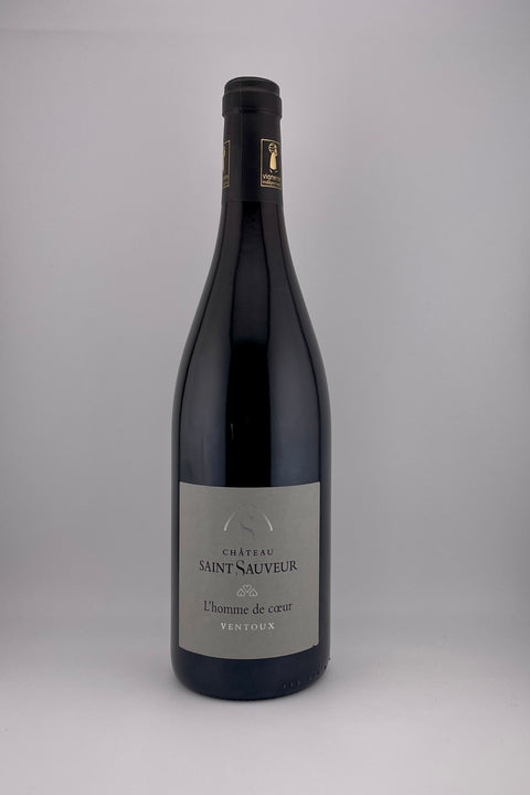 A bottle of L'Homme de Coeur, Château St Sauveur, AOC Ventoux, 2023 red wine with a label that includes the name of the wine and the château.