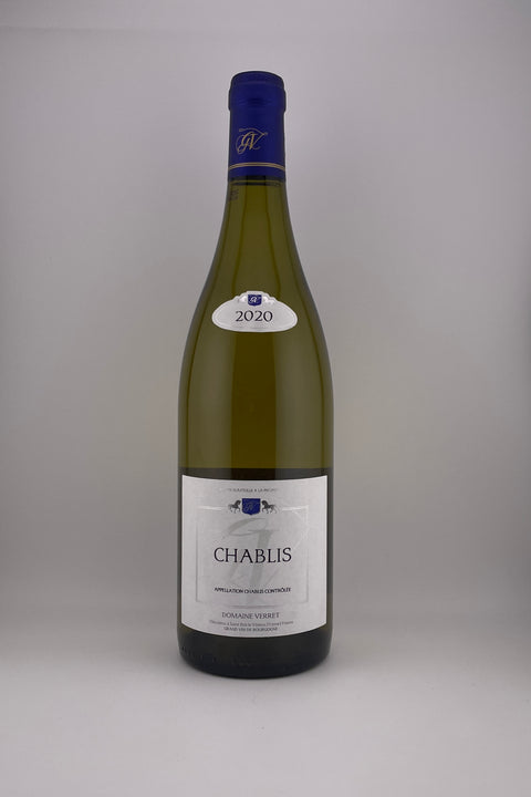 A bottle of Chablis wine with a label indicating it is from Domaine Verret, AOC Chablis, 2023.