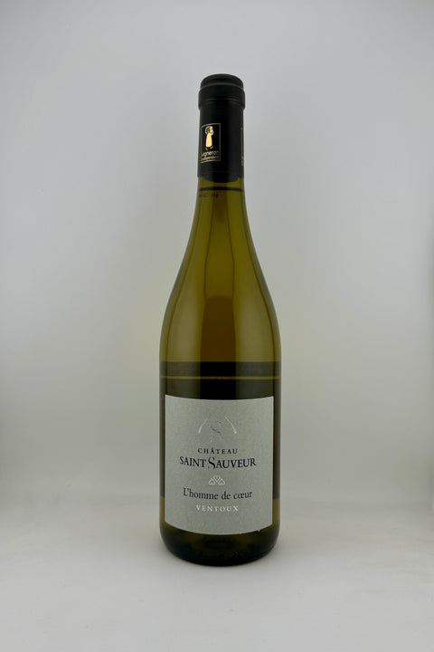 A bottle of L'Homme de Coeur, Chateau St Sauveur, AOC Ventoux, 2024 wine with a white label and a greenish tint to the bottle.