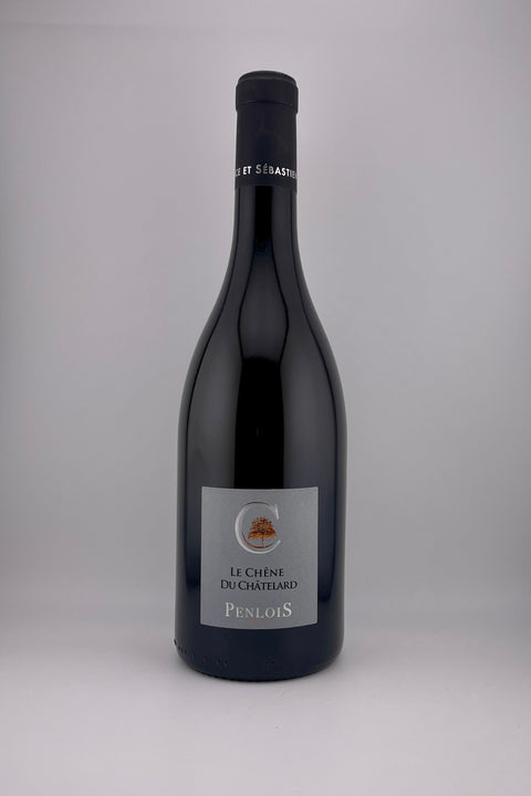 A bottle of Chêne du Chatelard, Domaine Penlois, AOC Beaujolais, 2018, red wine