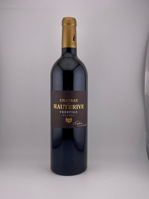 a bottle of Prestige, Château Hauterive, AOC Cahors, 2018, red wine